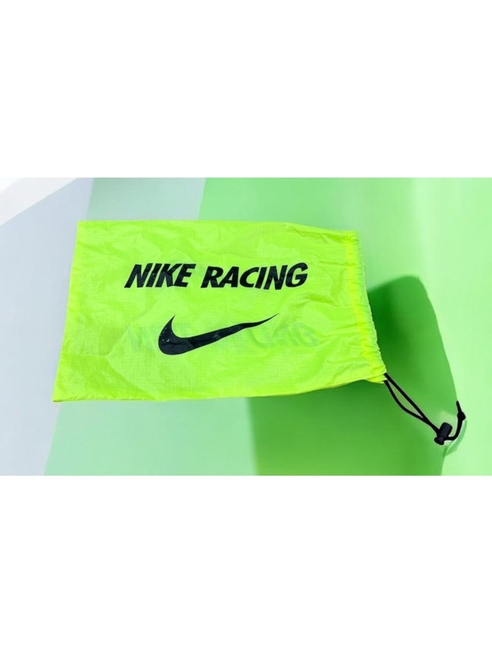 Nike Racing Drawstring Bag in Neon Yellow with Black Logo